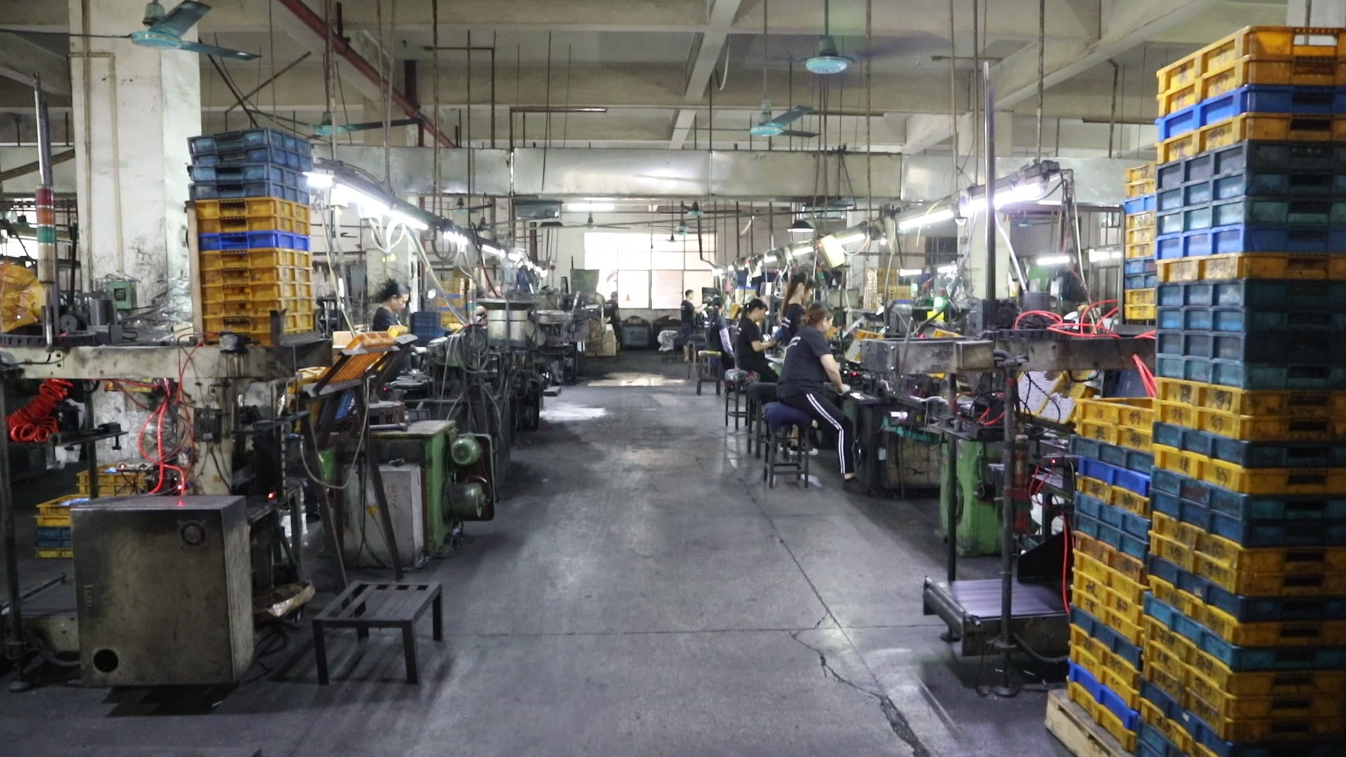 Real AA zinc carbon battery production line operating inside the factory